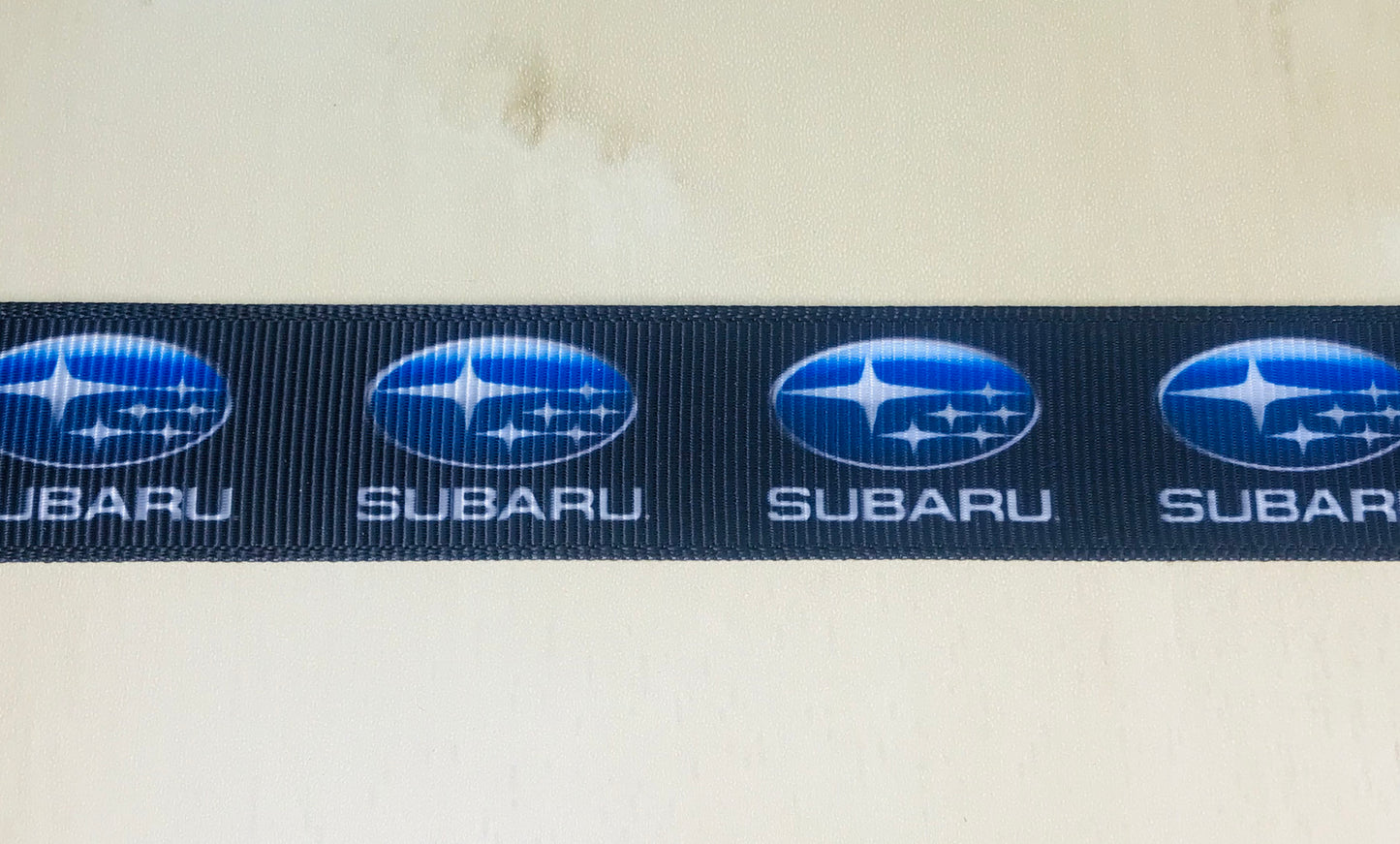 7/8" Wide Car Manufacturer Subaru Black Grosgrain Ribbon With Blue Logo Printing