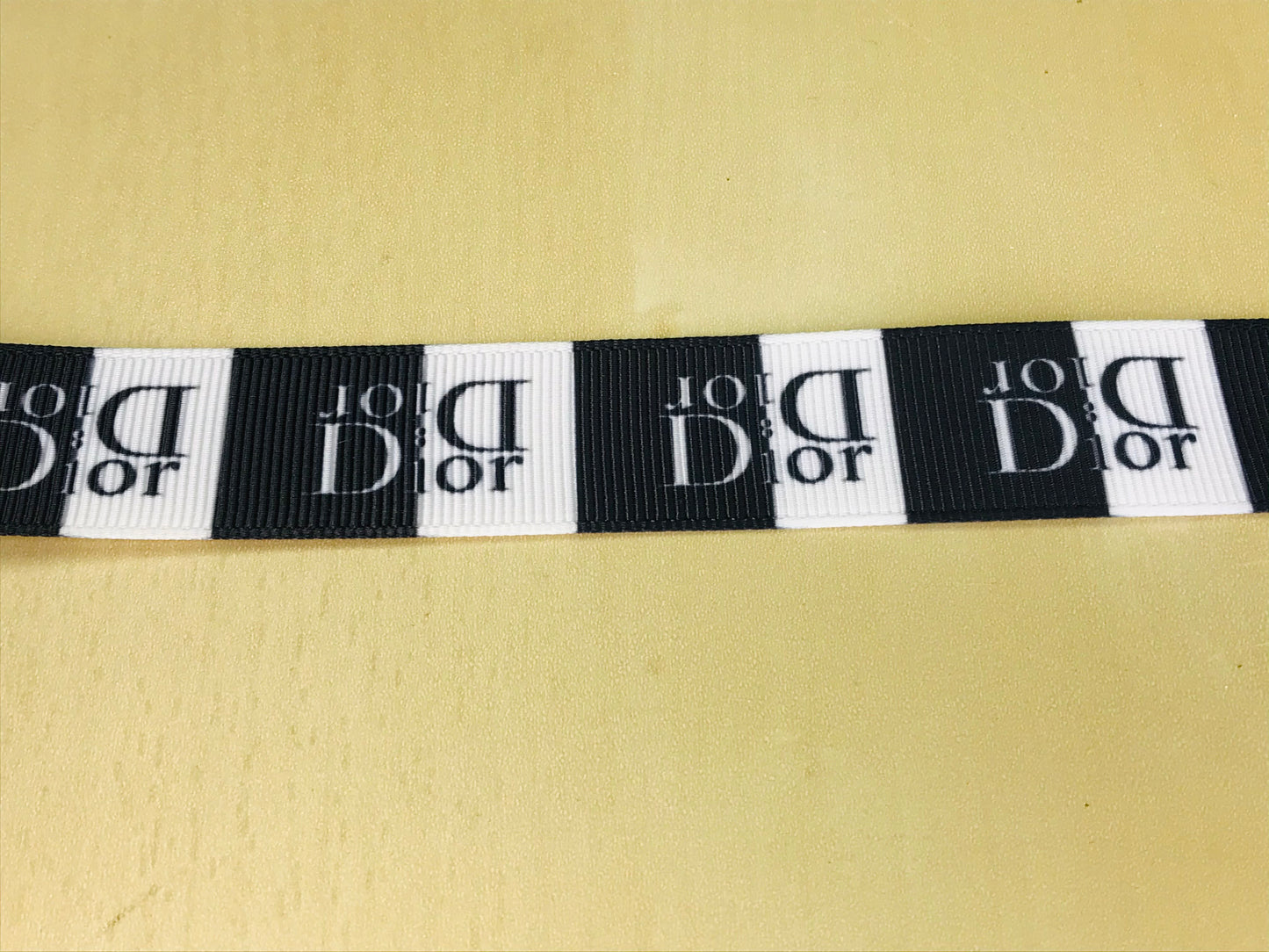 7/8" Wide Christian Dior Brand Logo Black & White Printed Grosgrain Ribbon