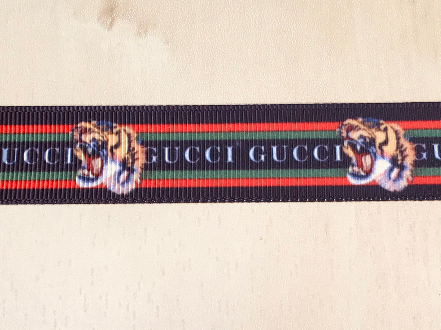 7/8" wide Gucci GG Tiger Rajah Red and Green Stripe Printed Grosgrain Ribbon