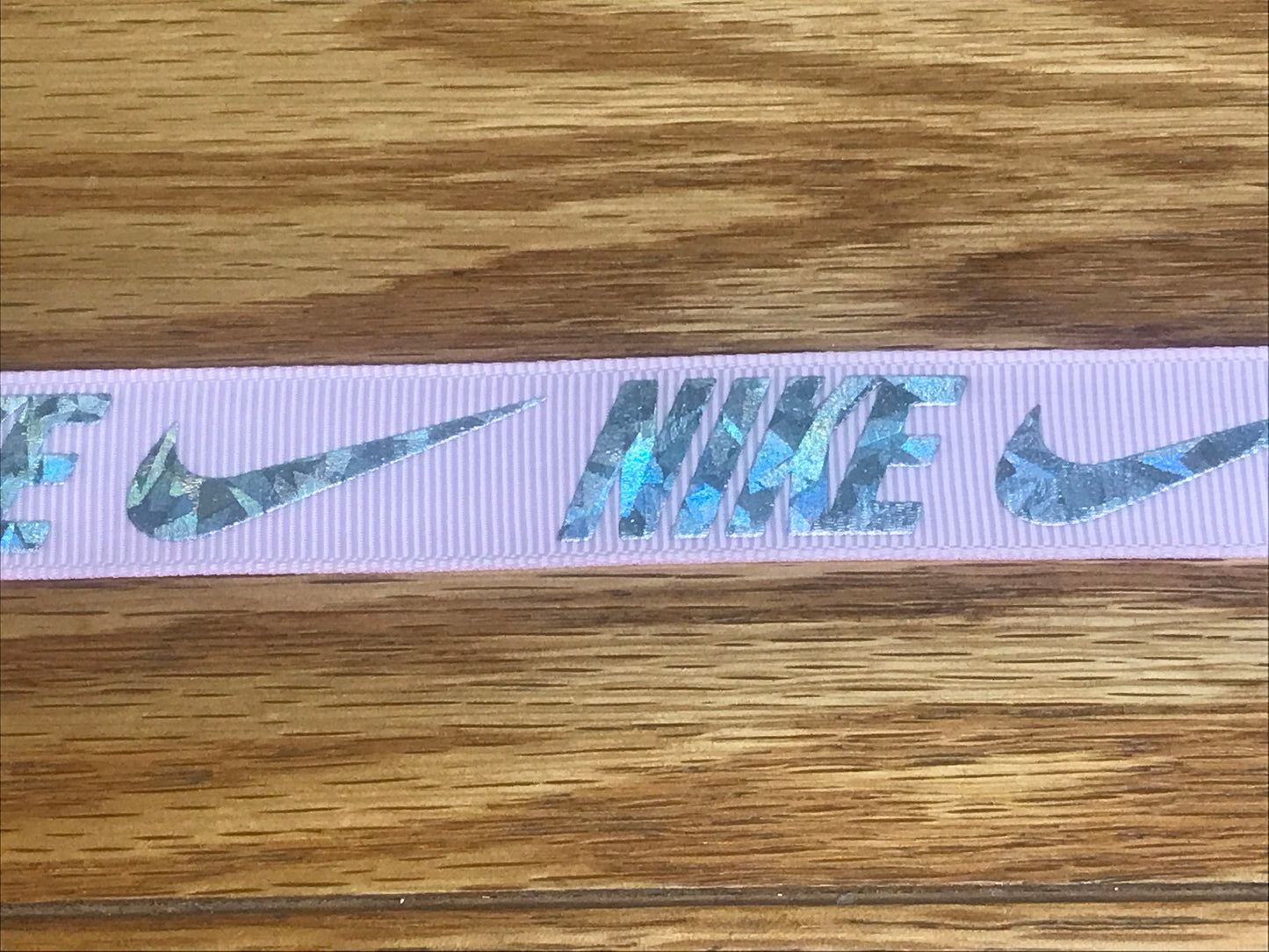 7/8" Wide Pink Grosgrain Ribbon With Hologram Nike Logo Printing