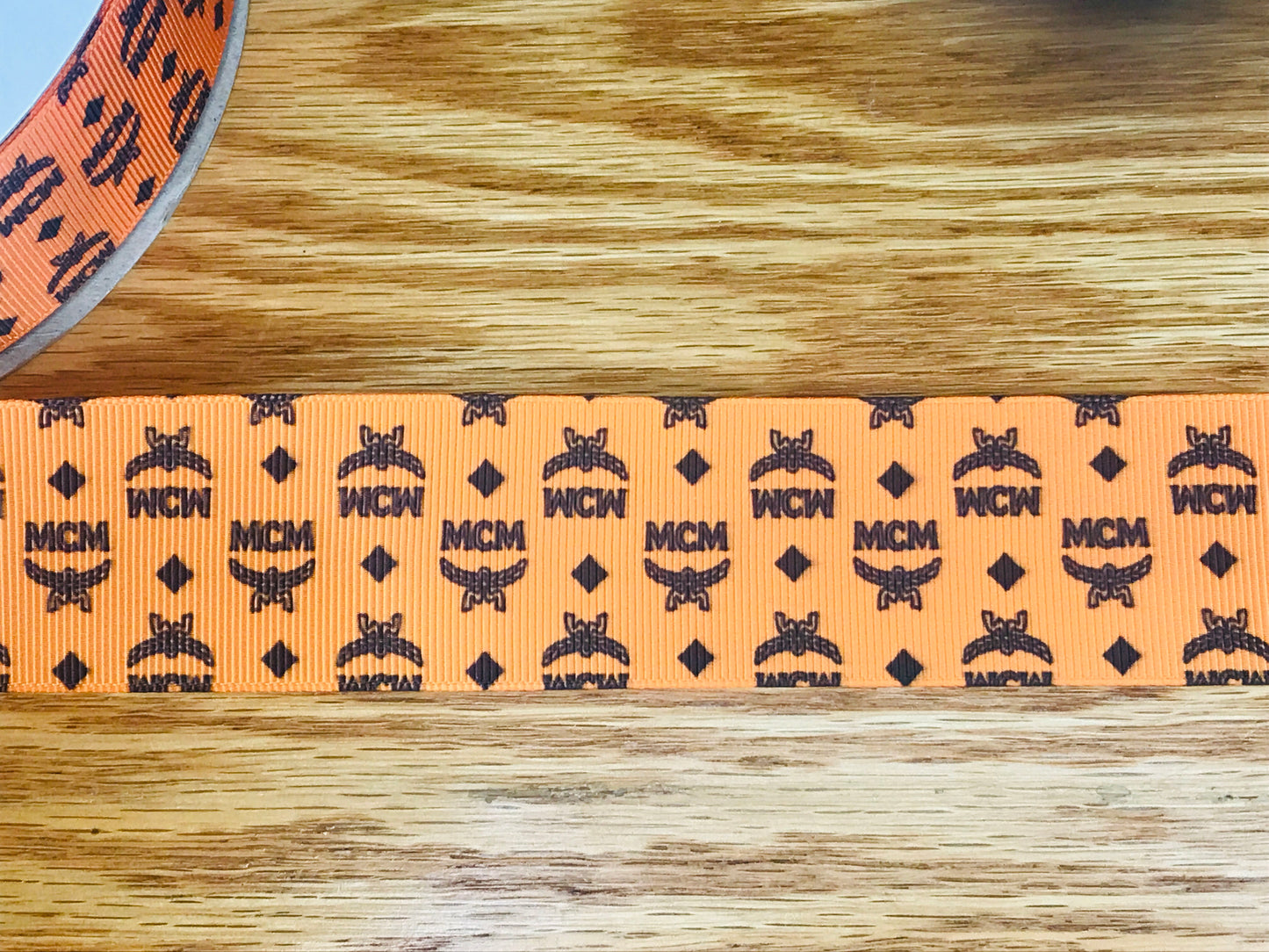 1-1/2" Wide Famous Brand Designer MCM Orange & Black Printed Grosgrain Ribbon