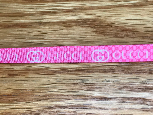 3/8" Wide Pink With White Lettering Gucci Printed Grosgrain Ribbon